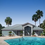 in-ground pool facing a townhome